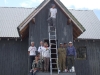 From left: Maurice, Tessa (seated), Bill, Helen, Jered (on ladder), Fred, Rick, Eric
